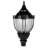 Decorative outdoor lamp with black metal and clear glass on a white background at switchtoled.