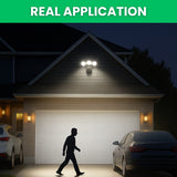 Garage with security lights on a house exterior at night