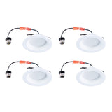 Four white recessed ceiling lights with wiring on a white background