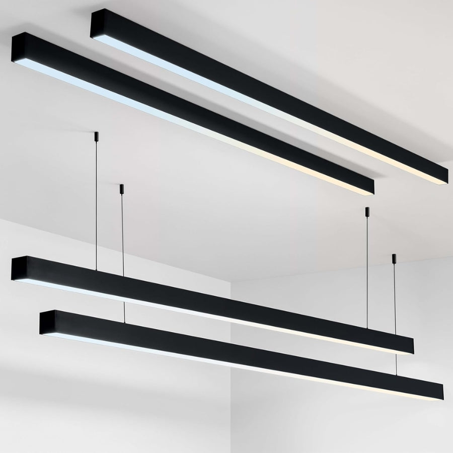Modern black pendant lights on a white background