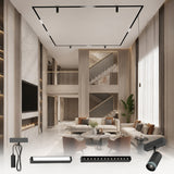 Modern living room featuring a complete recessed magnetic track lighting system with adjustable spotlights, linear lights, grille lights, and pendant modules for flexible architectural lighting.