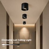Black surface mount LED ceiling lights installed in a hallway, showcasing TRIAC dimmable brightness control from 100% to 10%.