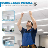 Technician installing a linear LED light fixture on a drop ceiling, demonstrating quick setup for recessed grid and pendant mounting options.