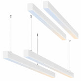 Sleek white linear LED pendant lights suspended from ceiling with minimalist design, showing both upward and downward illumination for modern interiors.