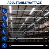 Warehouse interior with adjustable wattage lighting system shown on the ceiling