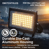 LED flood light with Yoke Mount on a snowy background, featuring UL and DLC logos.