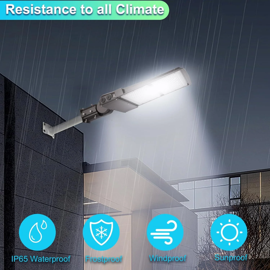 Street light with rain protection features on a building exterior