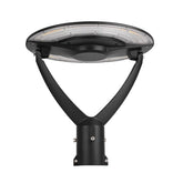 Black outdoor street light fixture on a white background