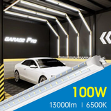 SwitchToLED 100W T8 LED shop light installed in garage, delivering 13000 lumens with 6500K daylight brightness