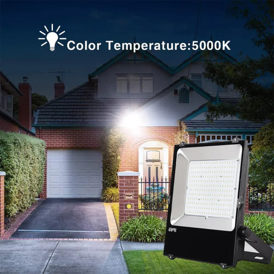 LED flood light in front of a house with 'Color Temperature: 5000K' text.