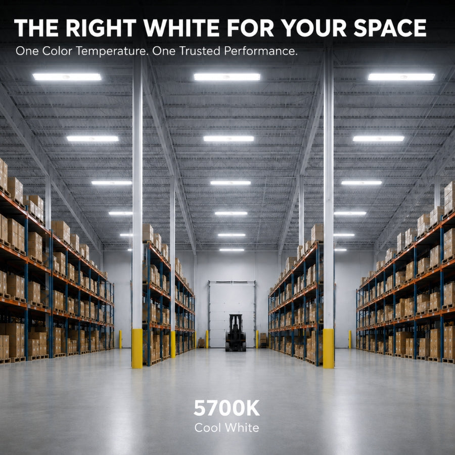 A warehouse aisle with tall shelving, boxes, and bright overhead fluorescent lighting. Text at the top reads 'THE RIGHT WHITE FOR YOUR SPACE' and at the bottom reads '5700K Cool White', suggesting a lighting product or color temperature demonstration.