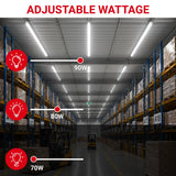 Warehouse interior with adjustable wattage lighting labels on the ceiling