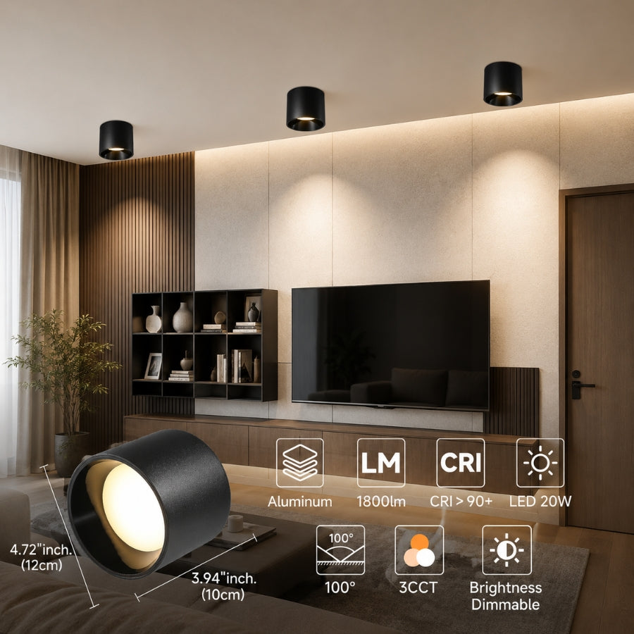 Modern living room with decorative wall lights and a television.