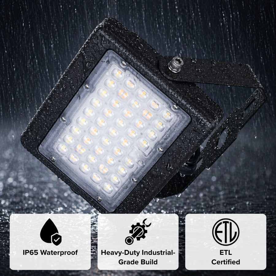 Heavy-duty industrial LED flood light with IP65 waterproof rating, designed for reliable performance in harsh weather conditions with ETL certification for safety.