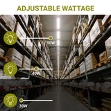 Warehouse with shelves and adjustable wattage labels showing 50W, 40W, and 30W. LED linear light fixture