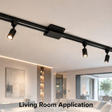 Modern living room featuring black single circuit track lighting powered by a floating canopy feed, providing seamless ceiling-mounted illumination for contemporary residential interiors.