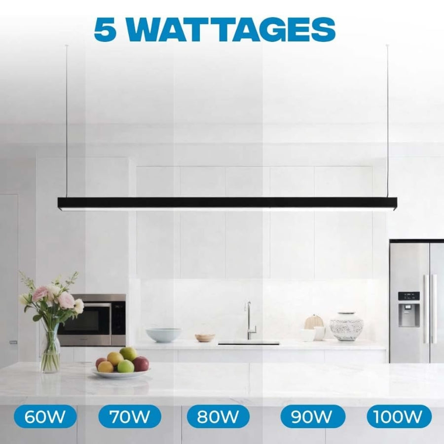 Modern kitchen with a range hood and wattage options displayed.