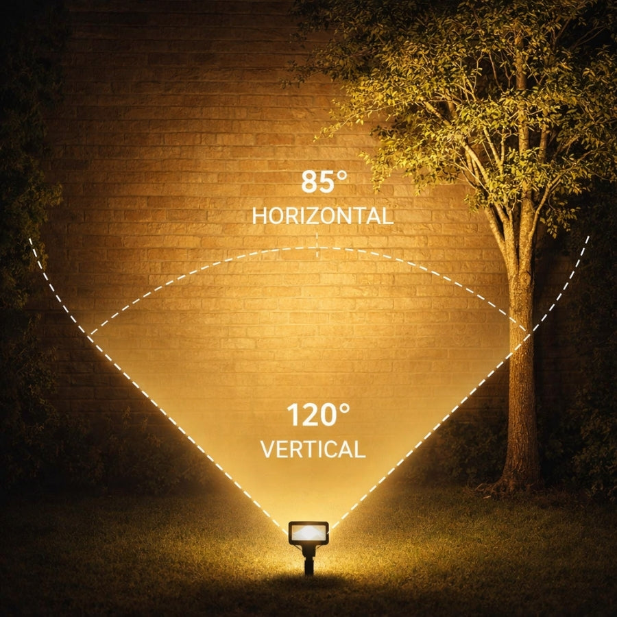 Light fixture with beam angles labeled on a brick wall and tree background