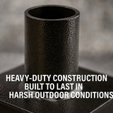 Black metal pipe with text about heavy-duty construction in harsh outdoor conditions