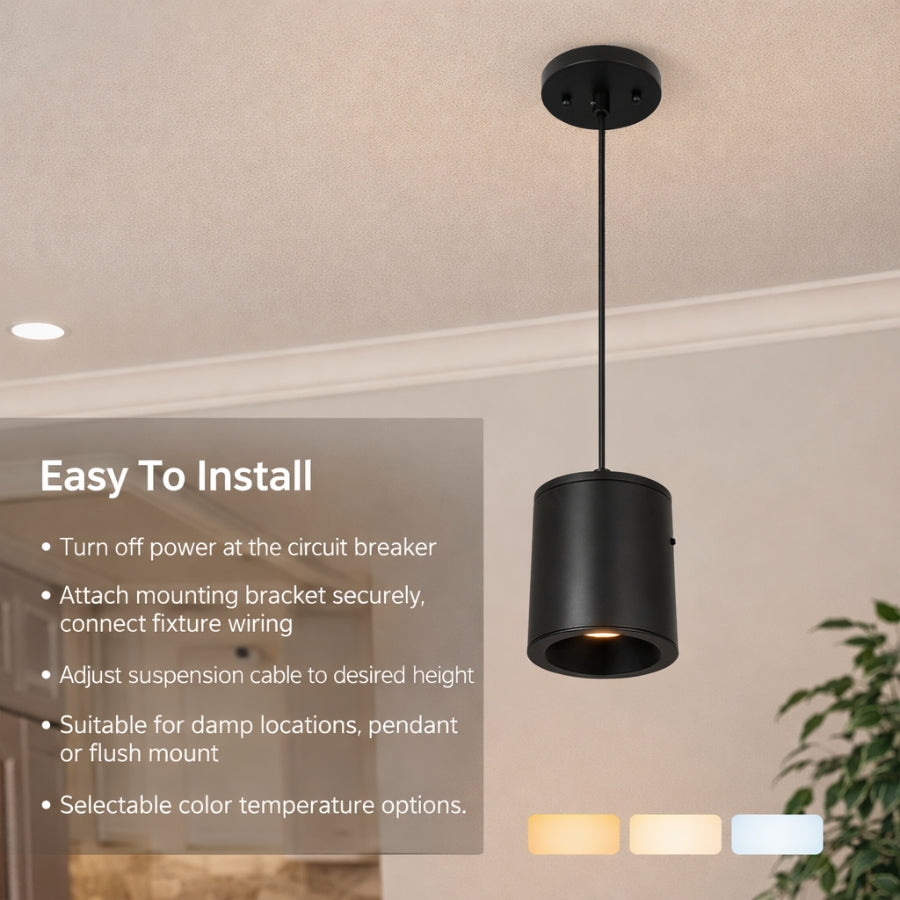 Black pendant light fixture on a ceiling with installation instructions.