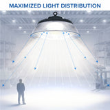 Industrial pendant light with maximized light distribution shown in a warehouse setting.