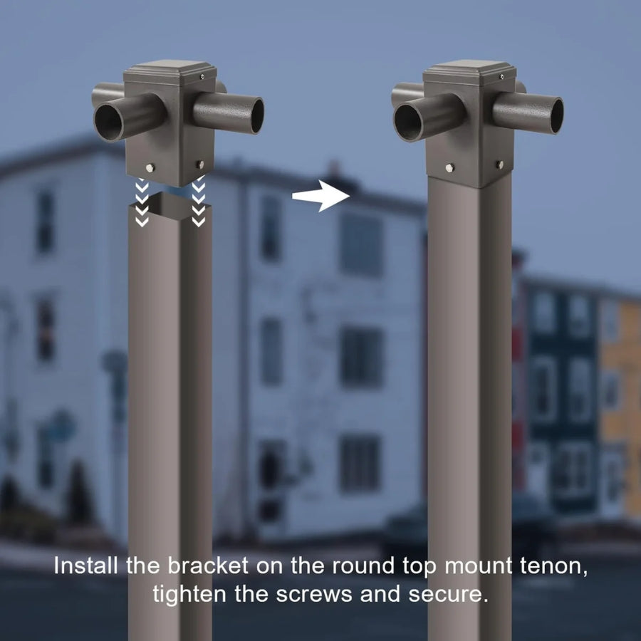 Two metal poles with brackets and screws against a blurred building background